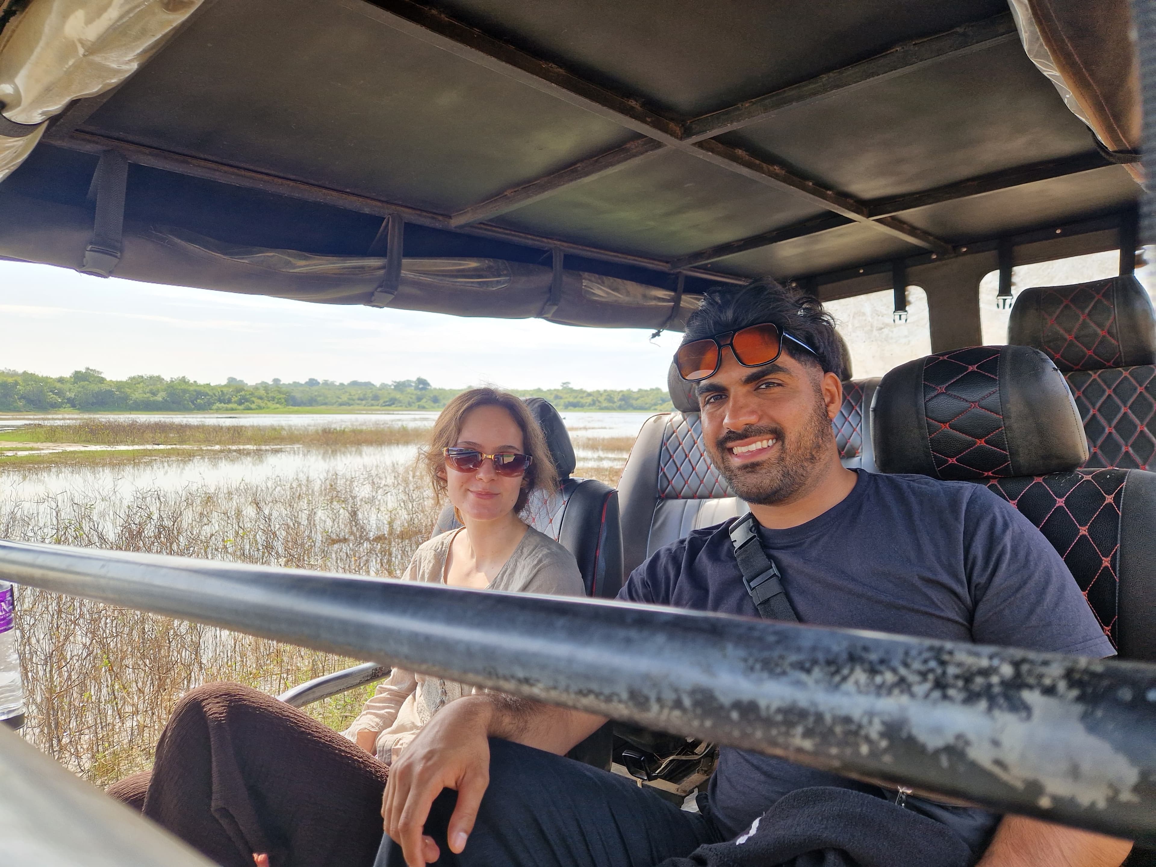 Guest in an open-roof safari cruiser